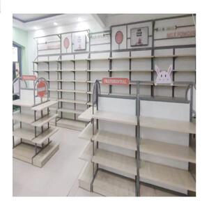 厂家定制母婴用品展示柜童装展示架圆弧设计婴幼儿服装中岛展示台