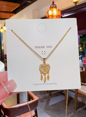 ins爱心轻奢小众吊坠新款月亮锁骨链设计颈链气质钛钢项链饰品女