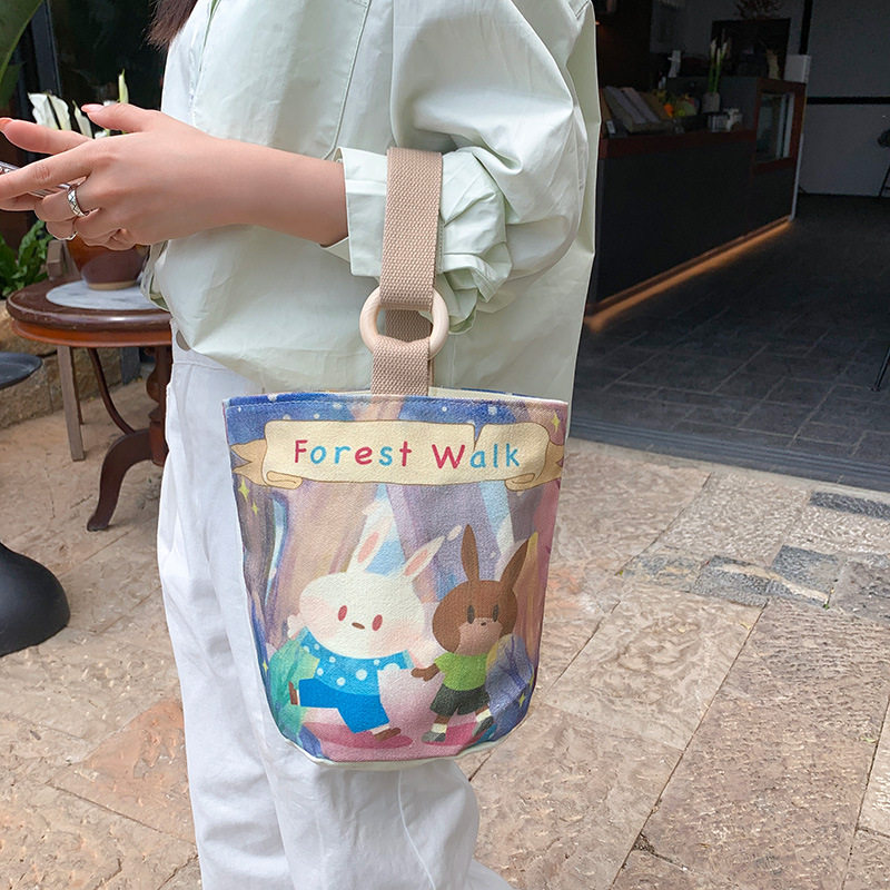 厂家帆布包女卡通时尚大容量水桶包学生饭盒袋通勤便当包收纳,箱包皮具/热销女包/男包,通用款女包,淘宝优惠券,粉丝福利购,淘宝优惠卷