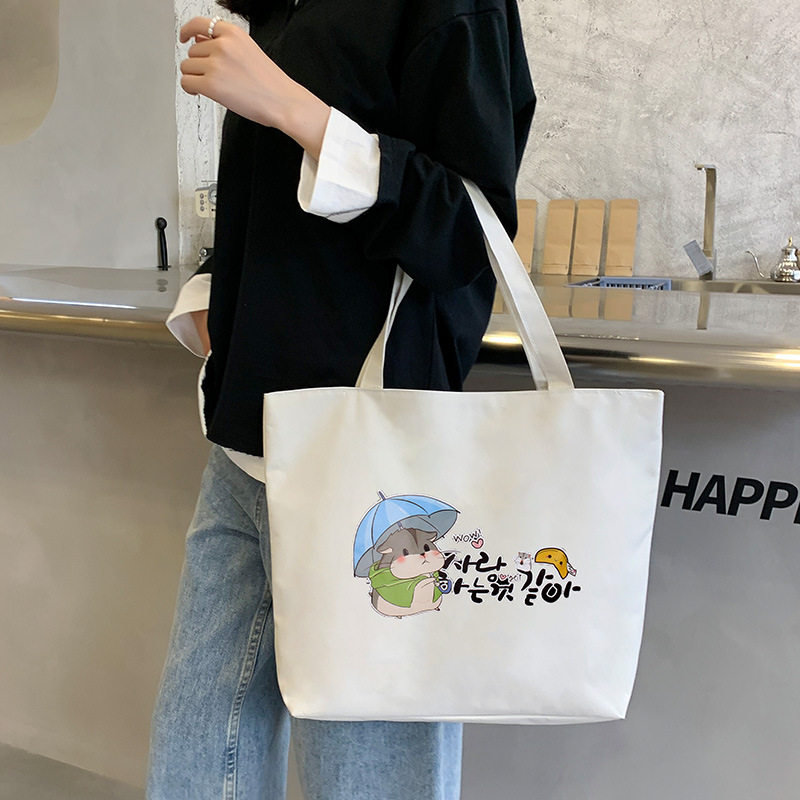 包包大容量女帆布包时尚斜挎包新款手提包小众设计中学生书包