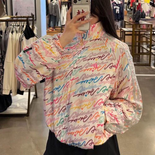 阿迪达斯女跑步涂鸦夹克