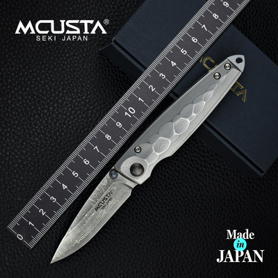 Mcusta传世家徽折叠刀日本正品