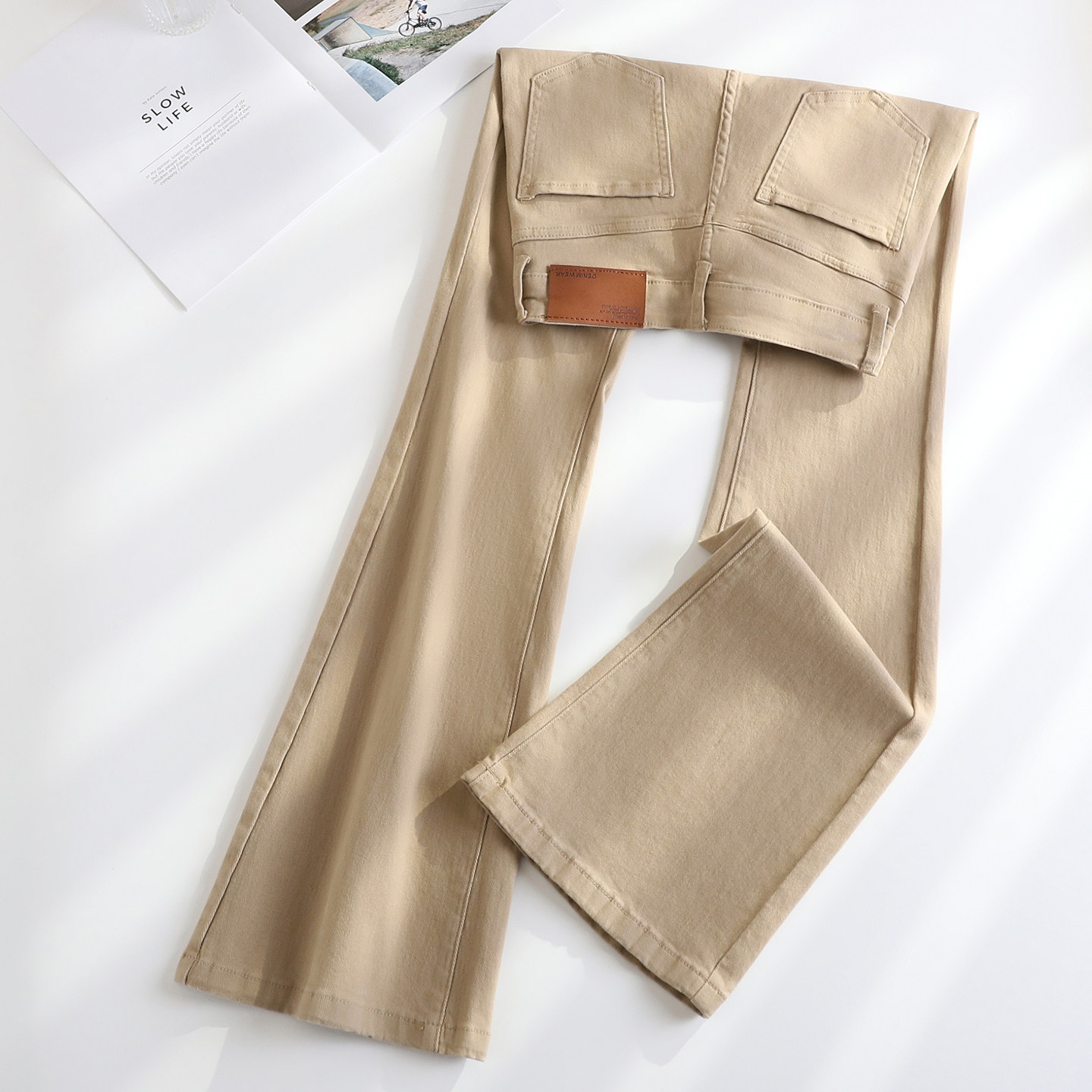 拉夏贝尔卡其高腰牛仔微喇裤女2026春季新款弹力喇叭小个子马蹄裤