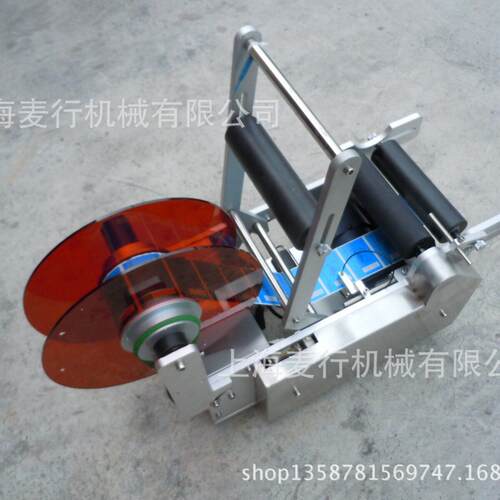 上SLD海麦行应化供妆品标行业不干胶动贴标机半自动塑手料圆贴机