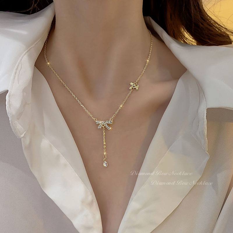 夏季新款蝴蝶结流苏项链女轻奢小众高级感锁骨链气质网红颈链配饰