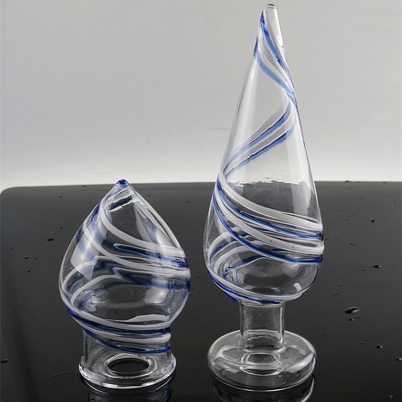 A self-pleasuring toy made of glass for use inside the anus.