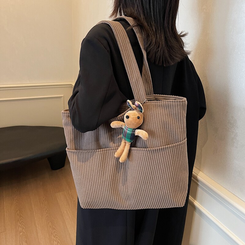春夏季大容量包包女2026新款休闲灯芯绒纯色单肩包学生上课托特包