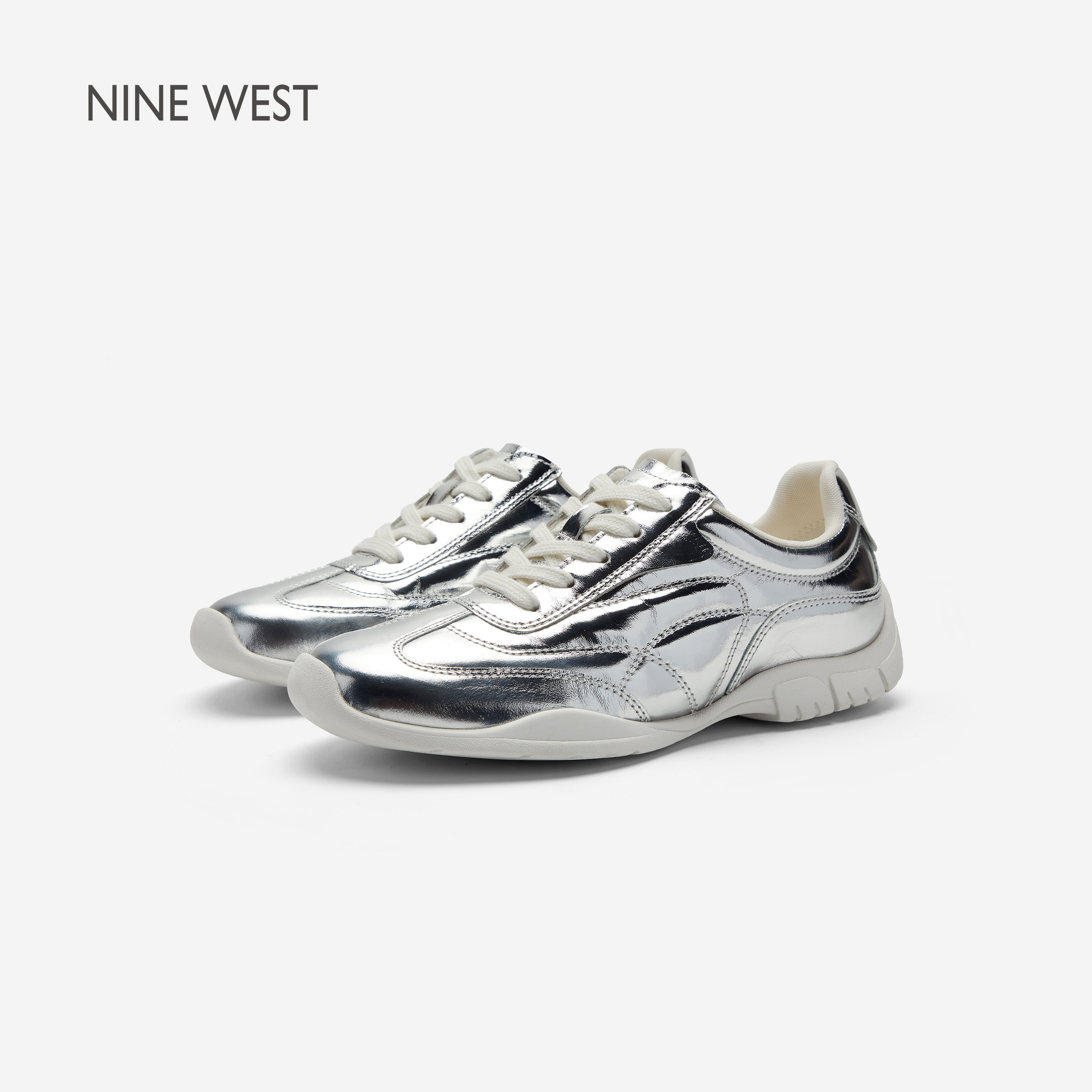 Nine West/玖熙银色星云镜面反光赛车鞋女复古休闲运动真皮德训鞋
