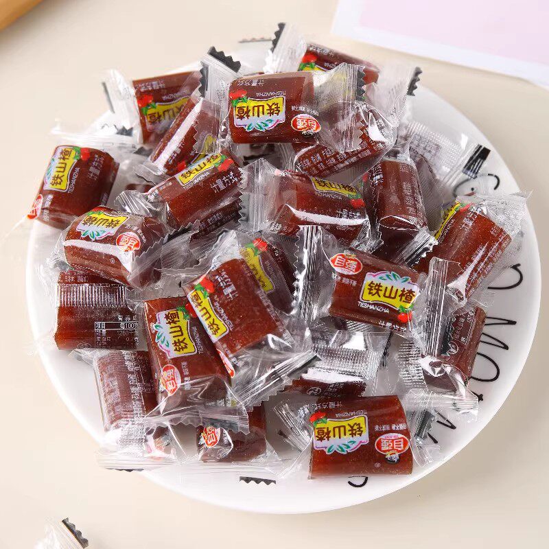 铁山楂儿童果丹皮老式卷果脯年货食品休闲零食散装山楂铁皮小包装