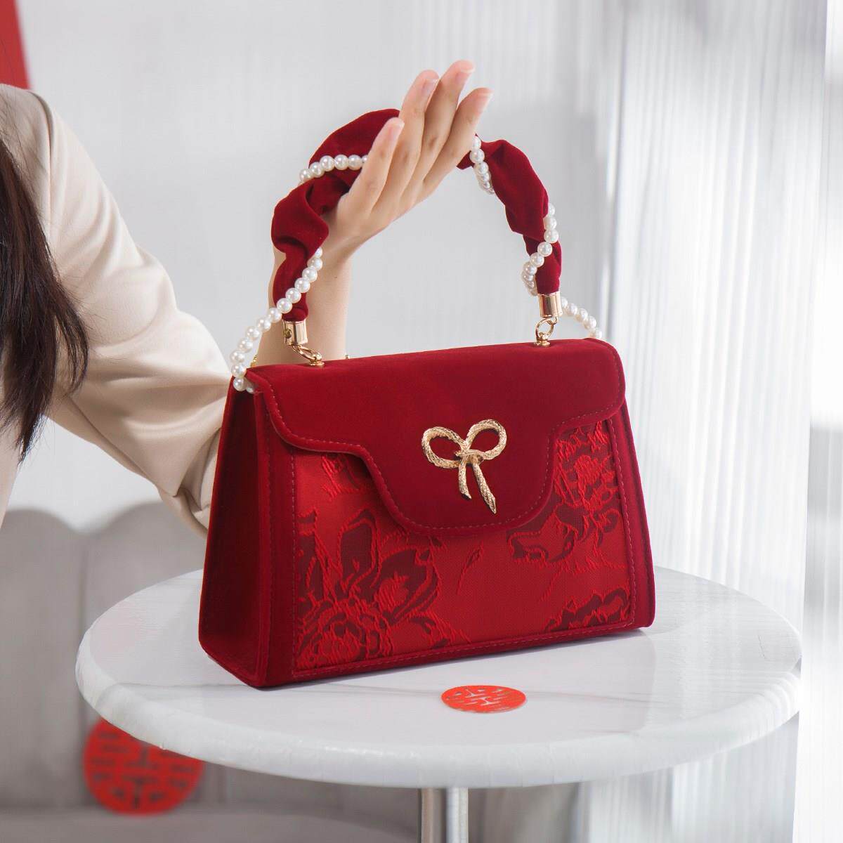 红色新娘婚包2025新款小众高级感国风中式手提包轻奢气质结婚包包