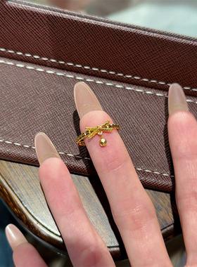 金色蝴蝶结仿蹦迪珠流苏戒指