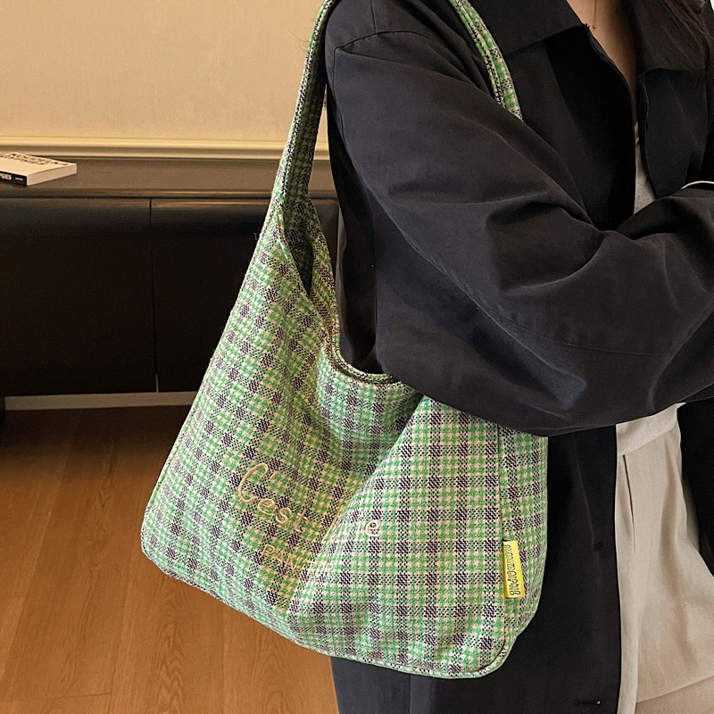 帆布格子包包女式2026新款秋韩版大容量托特包百搭学生上课单肩包
