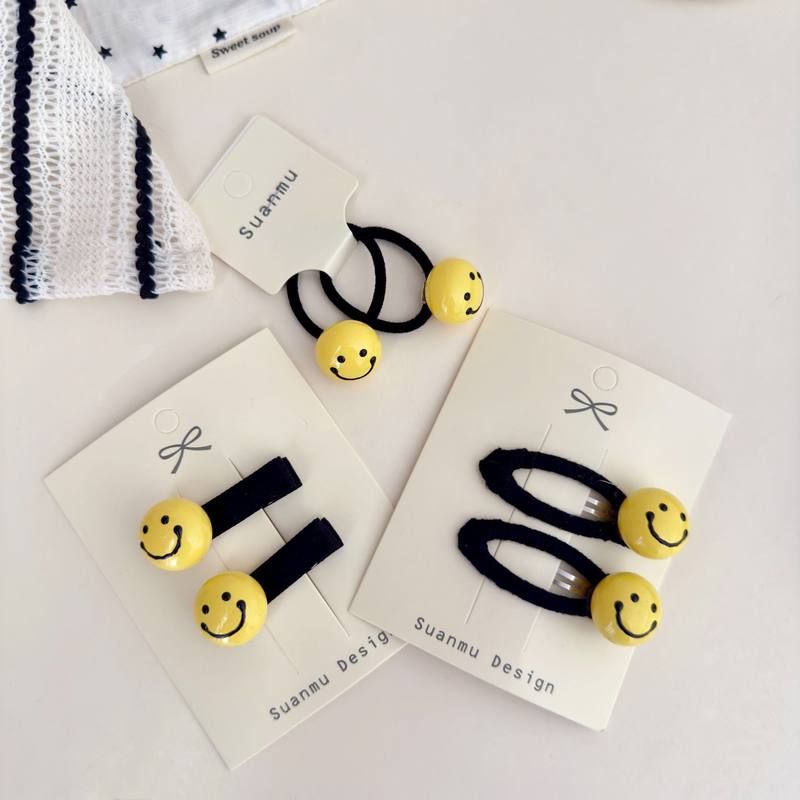 简约黄色立体笑脸儿童发夹发圈