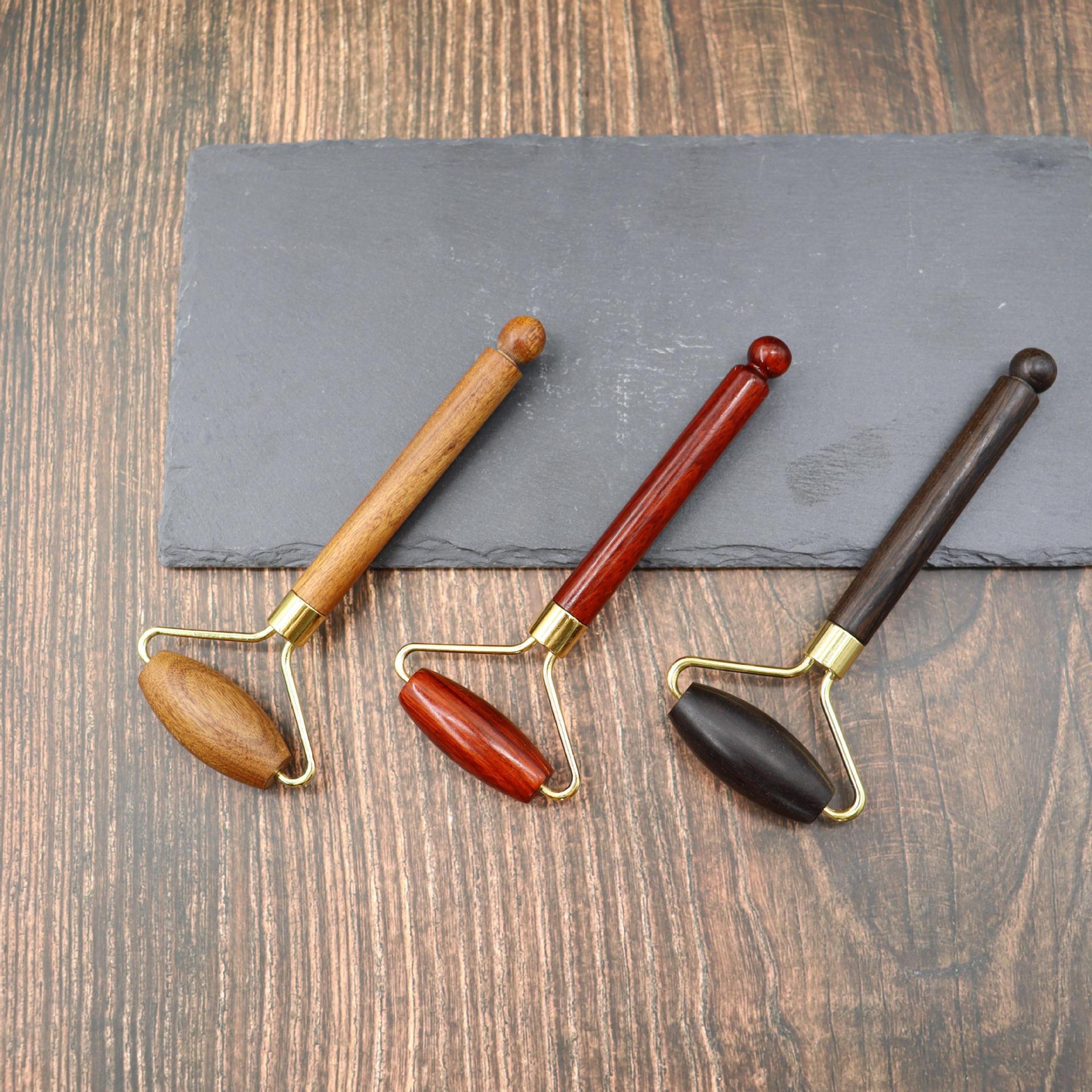 紫光檀滚轮按摩器紫檀木脸部按摩轮乌木按摩棒刮痧推拿按摩器