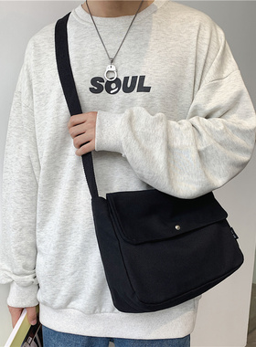 男士斜挎包潮牌ins小挎包女简约日系邮差帆布单肩包休闲百搭新款