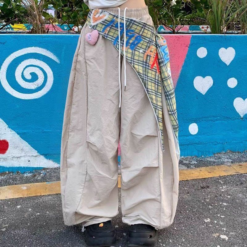美式复古辣妹宽松屁帘拼接工装裤女夏季2025新款伞兵裤休闲弯刀裤