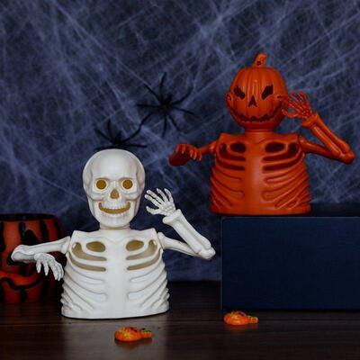 Crossing Halloween to decorate a skeletal electronic candlel