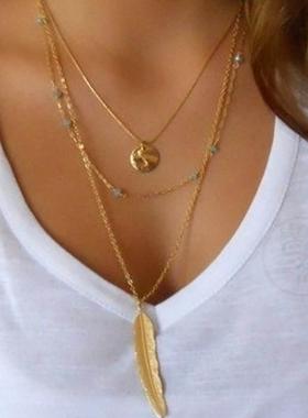 。Jewelry retro simple golden feather women