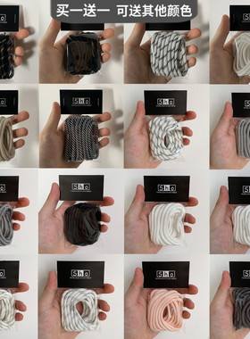 斐FLIA乐适配巴黎破坏者世家猫爪圆形鞋带老爹鞋黑白条纹米色