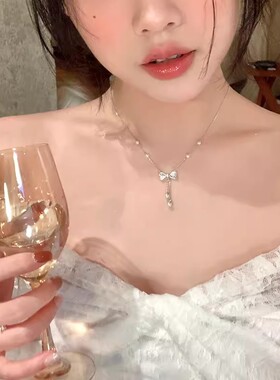 珍珠蝴蝶结流苏钛钢项链配饰女轻奢小众锁骨链高级感颈链2024新款