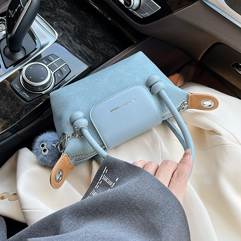 韩版多巴胺女士手提包包2026春夏新款百搭高级感斜挎包精致饺子包