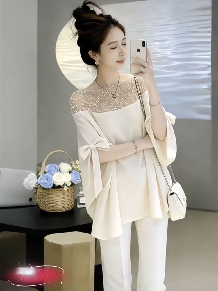2026夏季网红款重要场合白色上衣女法式名媛重工珍珠拼接斗篷衬衫图片