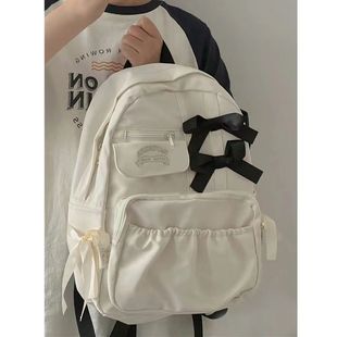 日系ins可爱少女蝴蝶结书包女初中学生高中生高颜值奶白色双肩包