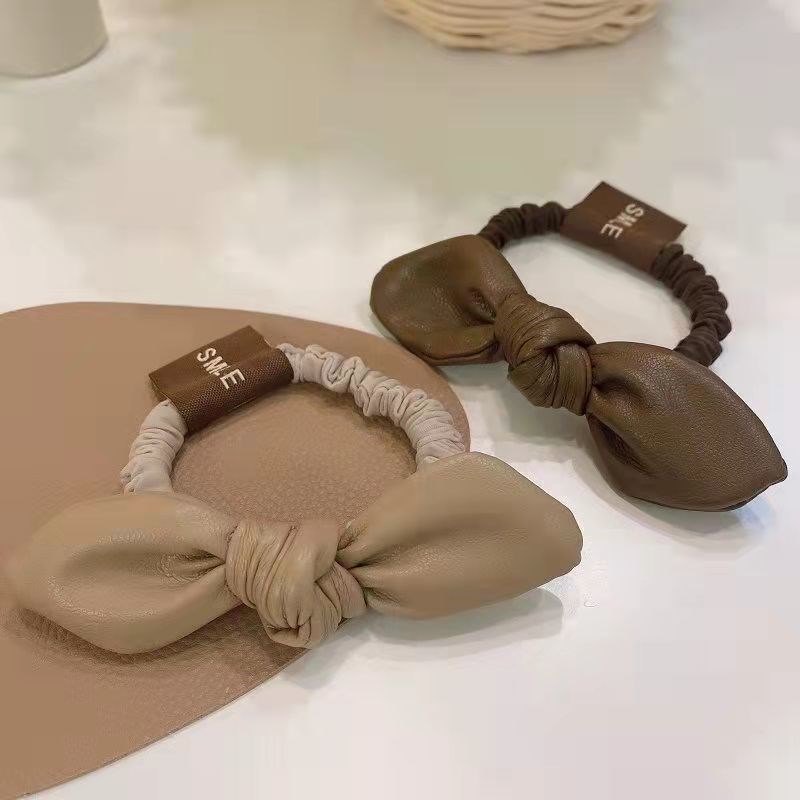 奶咖色蝴蝶结笑脸发绳简约