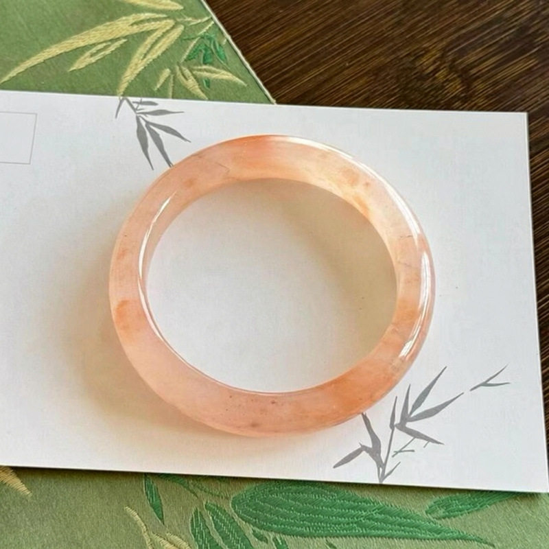 高冰透西柚色飘花金丝玉粉色手镯