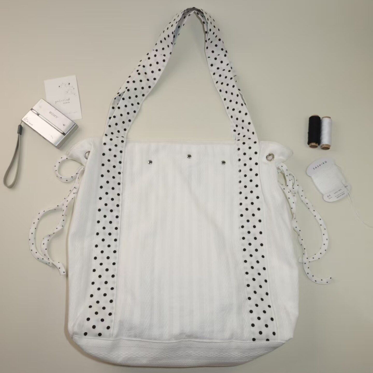 抹点条纹花苞系抽绳托特包2025新款韩系百搭大容量单肩通勤收纳包,箱包皮具/热销女包/男包,时尚帆布包,淘宝优惠券,粉丝福利购,淘宝优惠卷