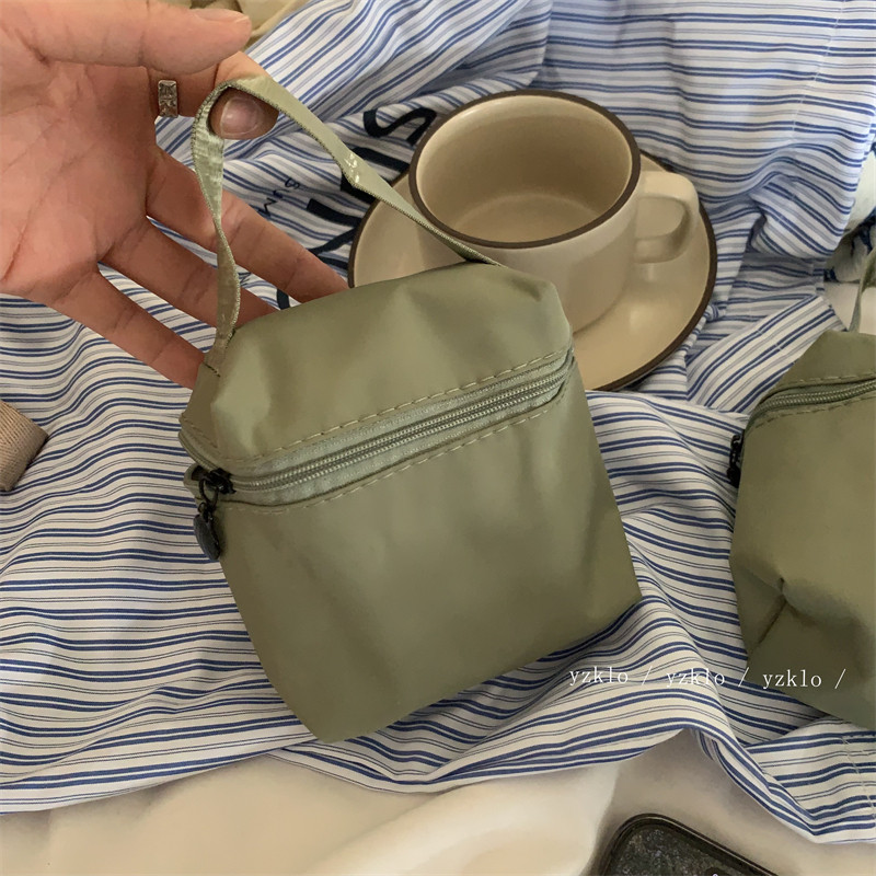 高级风绿色收纳袋好看口红数据线精油小样质感尼龙手提化妆包迷你