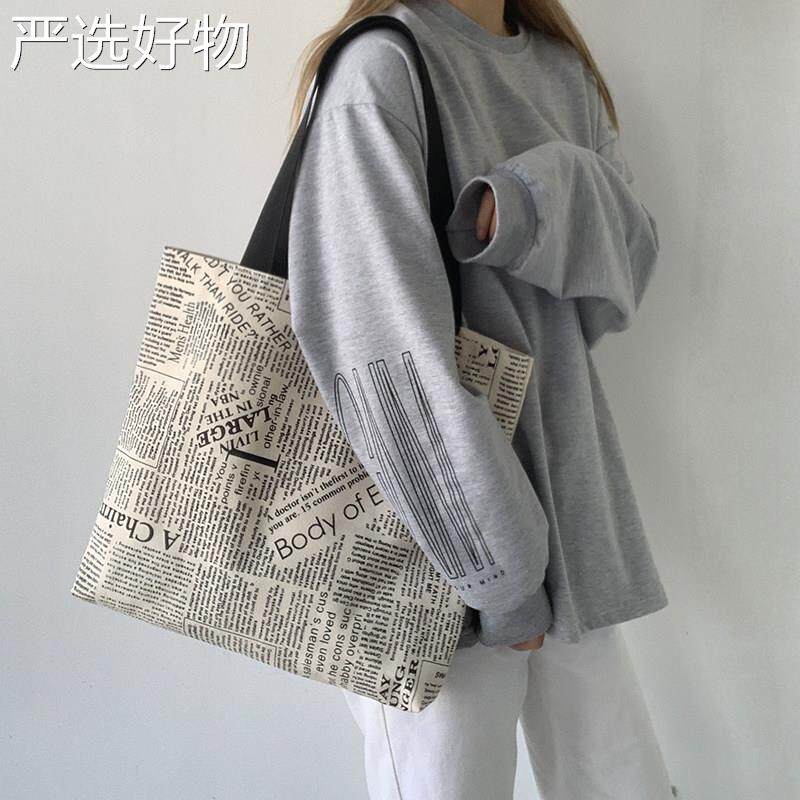 【全国包邮】帆布包包女容量大儿小众单肩手包袋大学生上装课书包