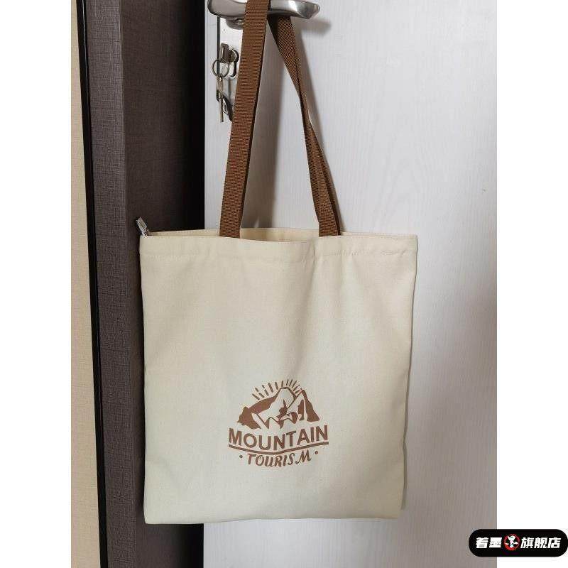 手提环保收纳帆布袋日韩简约慵懒风松弛感包男女通用大容量通勤包