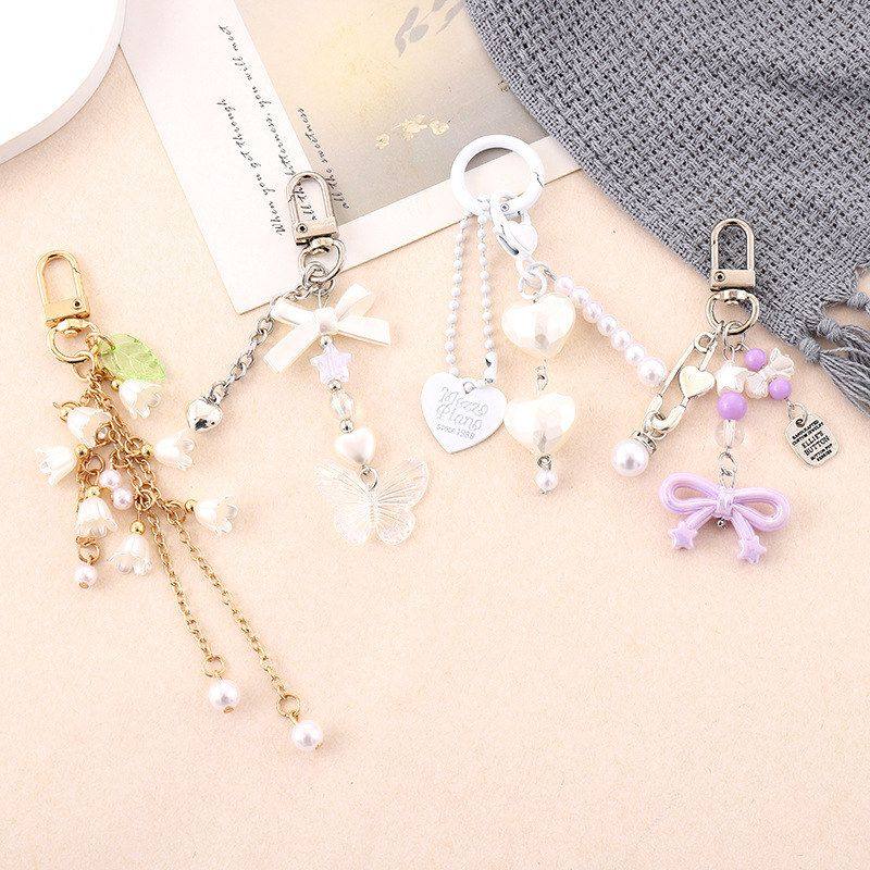 创意新款树脂蝴蝶手机挂件时尚百搭书包挂饰挂链汽车钥匙扣挂件,节庆用品/礼品,挂饰/生肖挂饰,淘宝优惠券,粉丝福利购,淘宝优惠卷