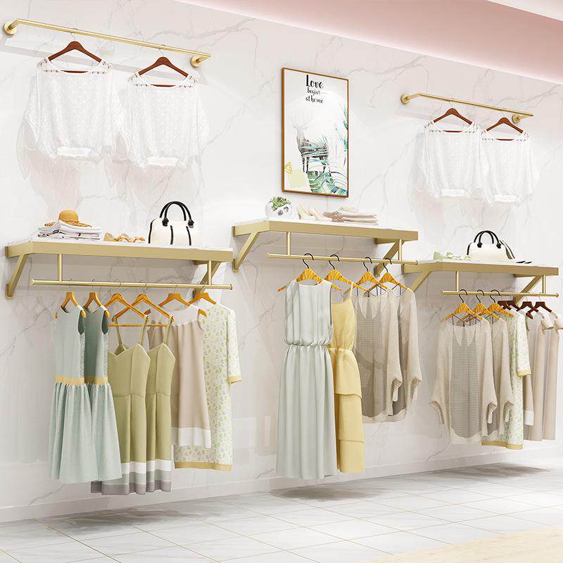 男女服装店上墙挂衣架 壁挂式服装展示架童装店墙壁装修金色货架