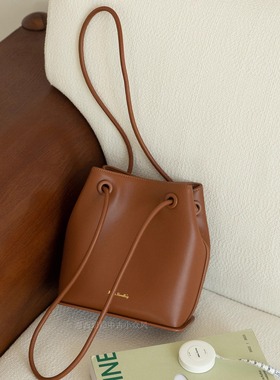 摩西奶奶 牛皮水桶包单肩斜挎抽绳极简包 流光智性风包 2025新款