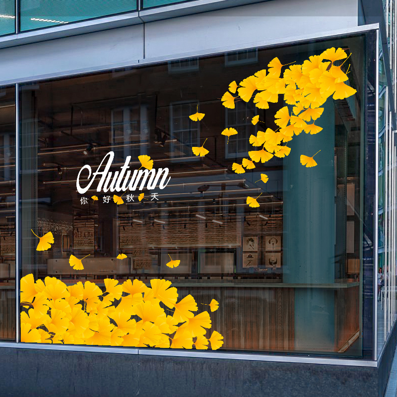 秋天来了银杏叶子金黄色装饰服装店新品上新秋日氛围装扮玻璃橱窗