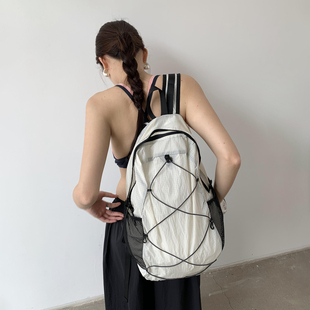 Unique blue通勤速干抽绳调节肩带大容量登山包旅行包双肩背包女