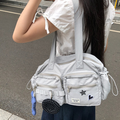 Unique blue韩系甜酷轻便大容量防水多功能收纳单肩包女休闲通勤