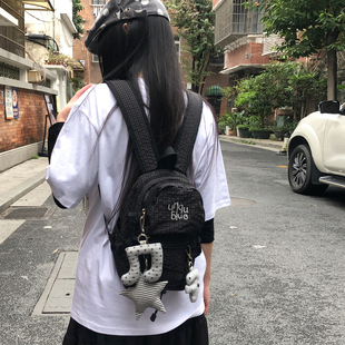 Unique blue韩系抽绳格纹双肩包女学生通勤户外轻便背包防泼水