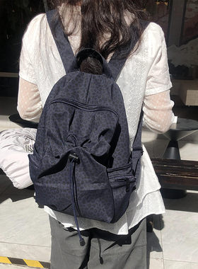 Unique blue 韩亚风豹纹学生旅游通勤电脑包背包百搭书包双肩包女