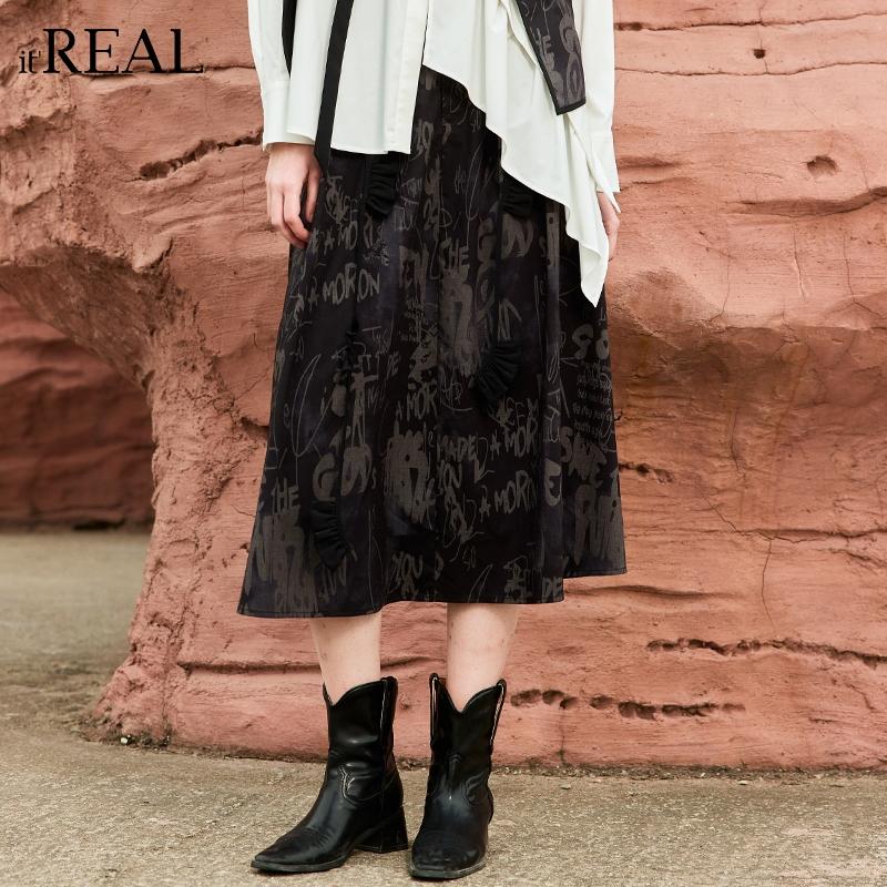 春秋新款设计感伞裙暗纹字母长裙