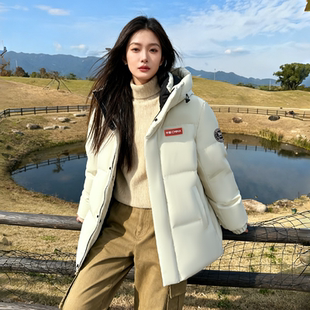 鸭鸭2025新款羽绒服女士2026高端贵气感外套时尚纯色厚款防寒冬装