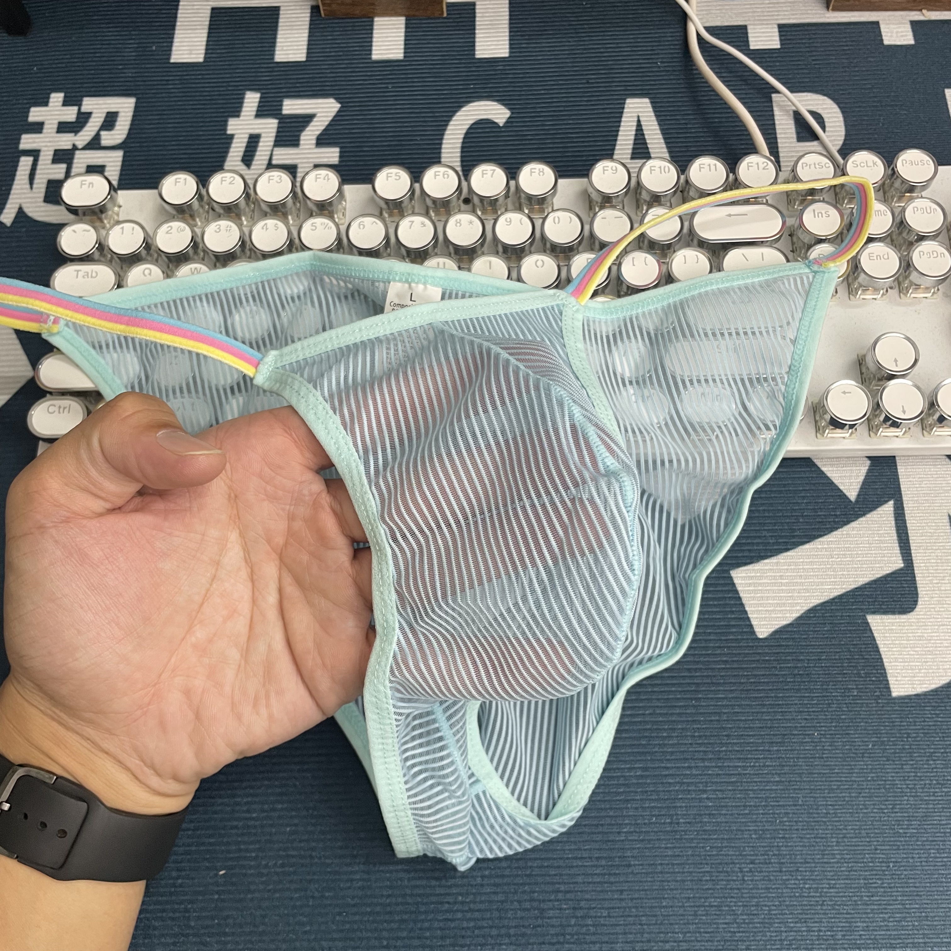 新款男士性感内裤三角裤透明网纱透气弹力时尚个性低腰三角裤男