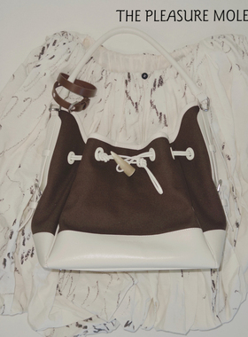 the pleasure molecule牛角桶包牛皮拼帆布大容量水桶包单肩斜挎