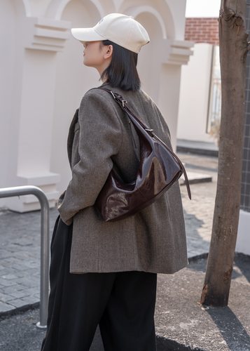 油蜡牛皮女手提腋下饺子包百搭