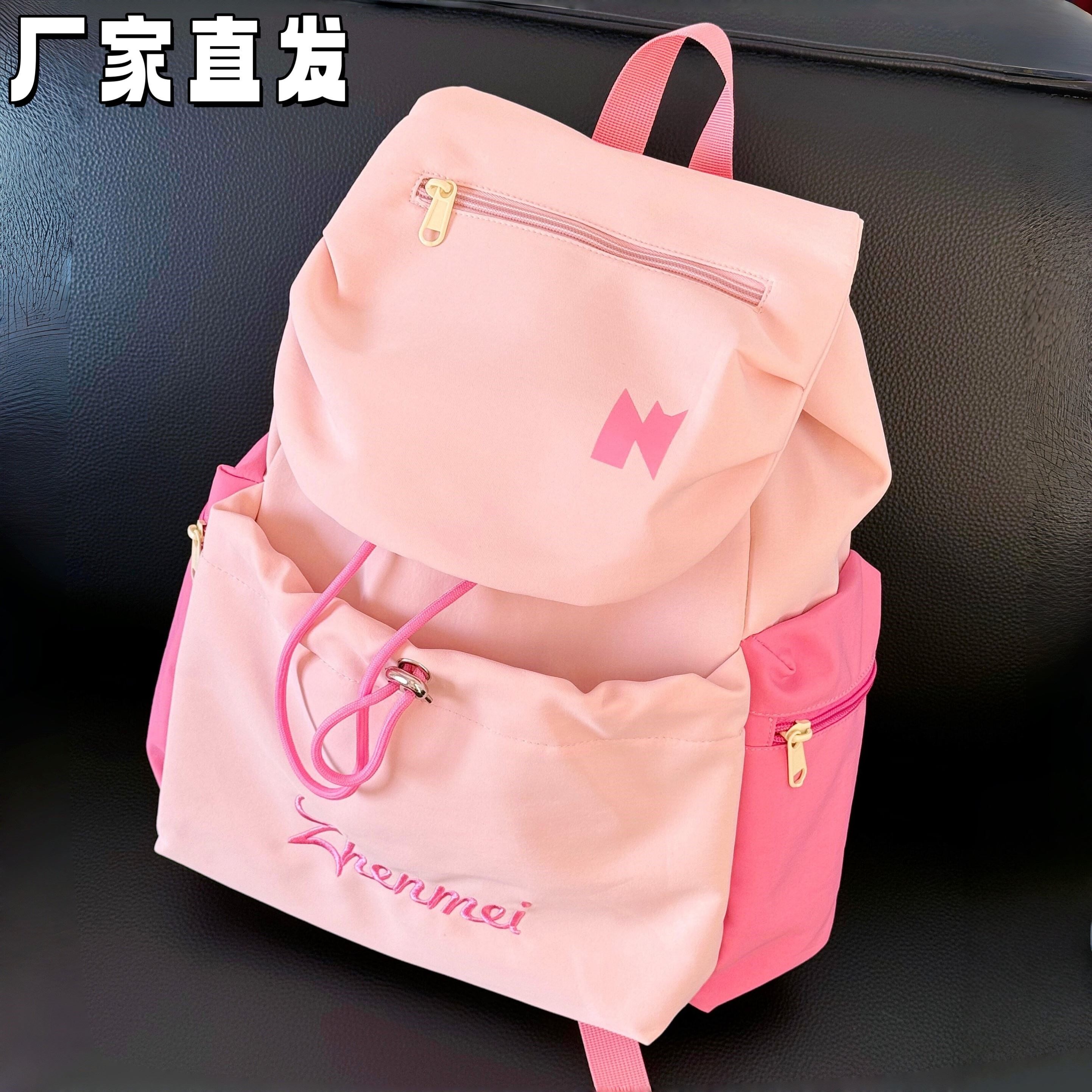 樱花粉双肩包女简约ins小众旅行外出通勤背包学生百搭大容量书包