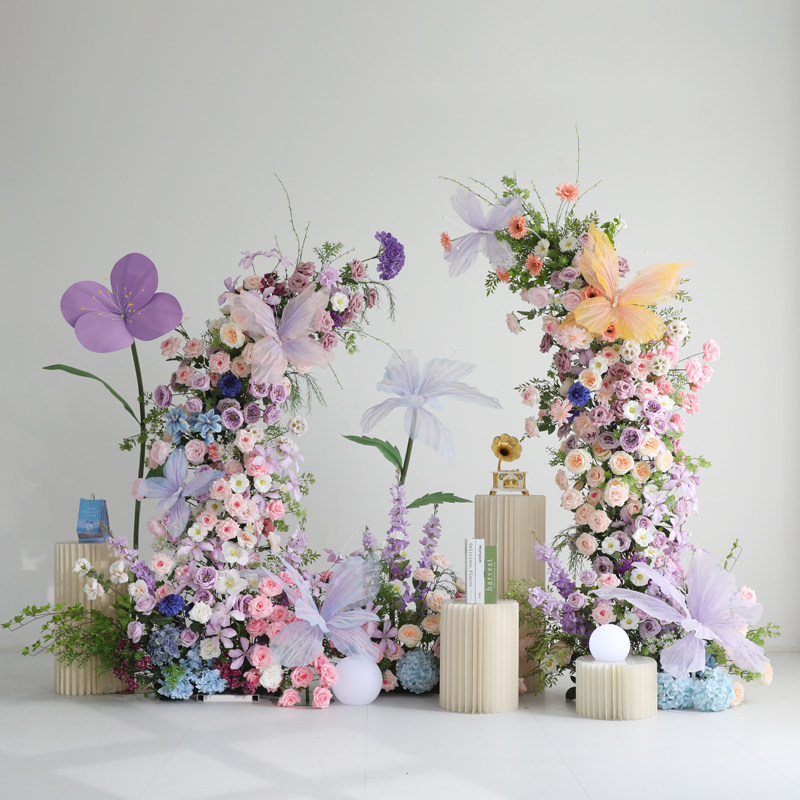 莫奈花园蝴蝶仿真花婚礼装饰牛角花艺拱门橱窗交车仪式区场景布置