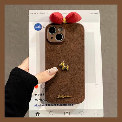 手机壳硅胶月坑纹秋冬毛绒蝴蝶结