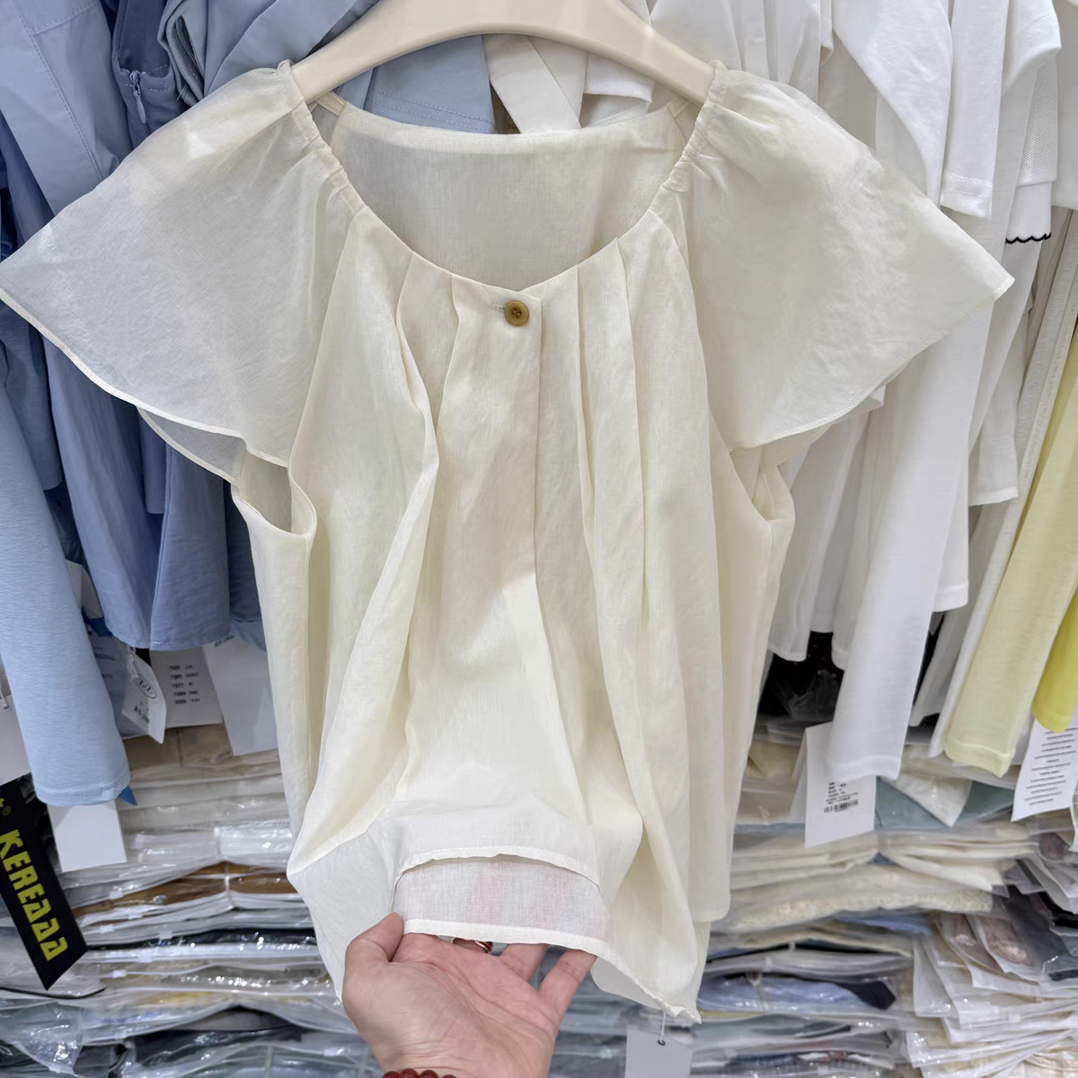 2025夏季韩版设计感背后开叉圆领压褶衬衫女甜美减龄洋气宽松小衫